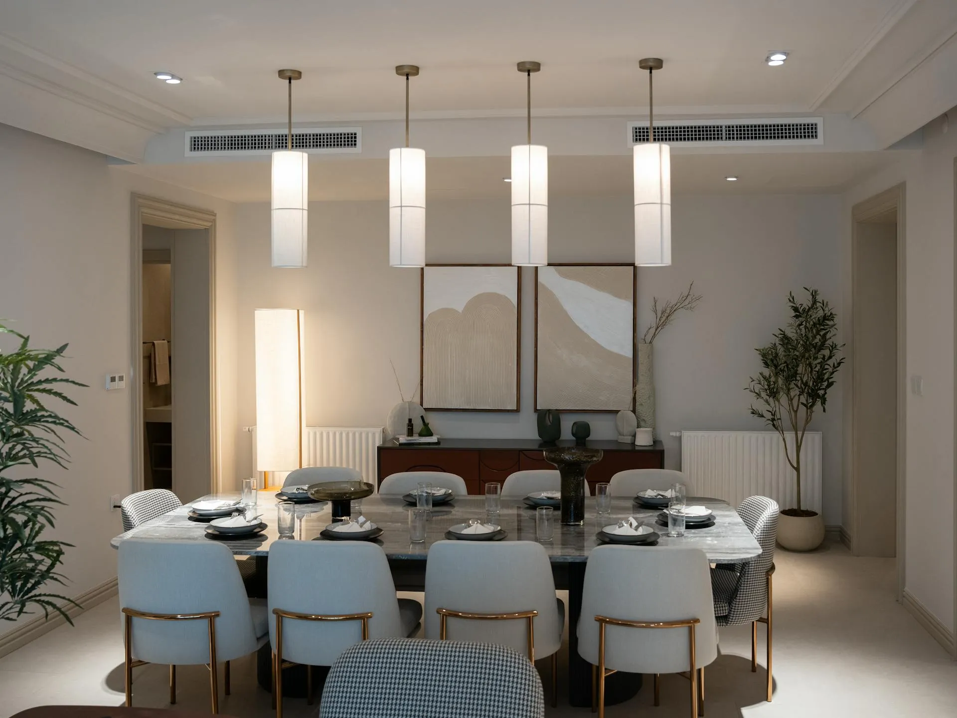 Real estate agent guiding home buyers at Nest & Key Realty